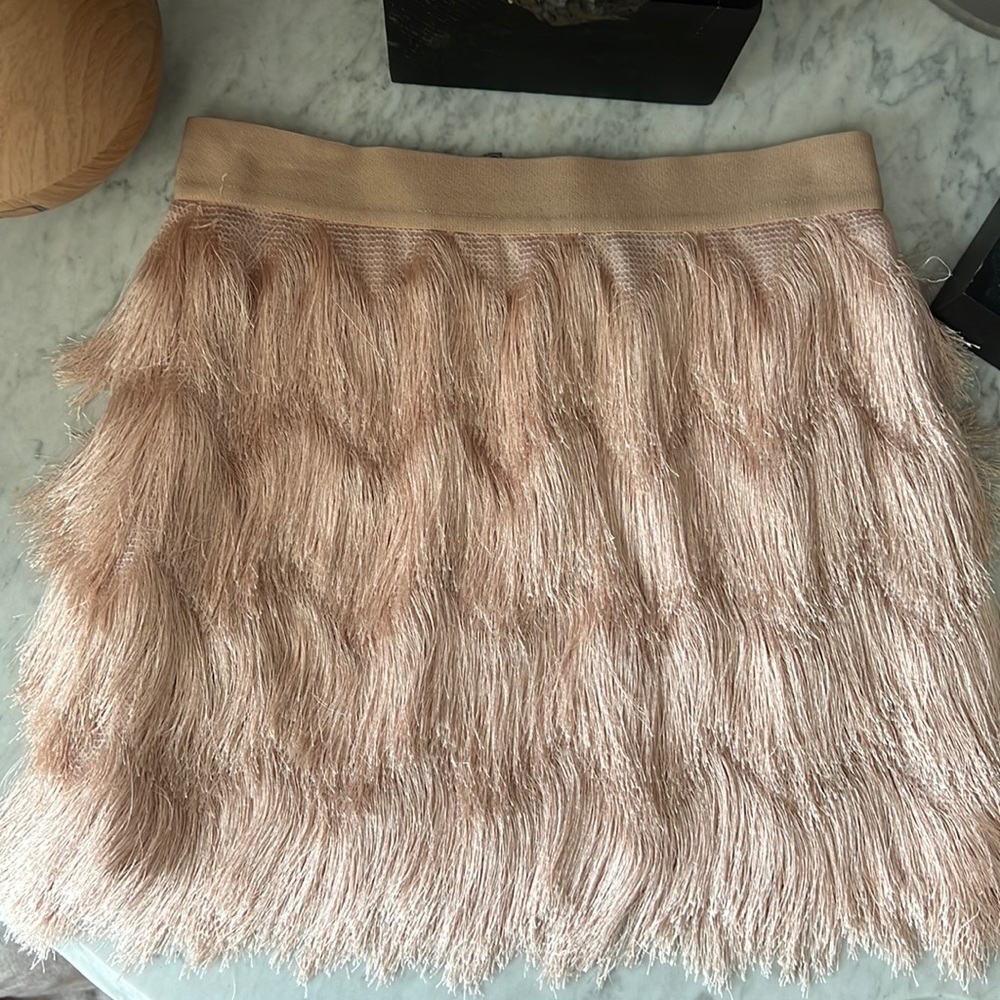BCBG soft pink fringed mini skirt.